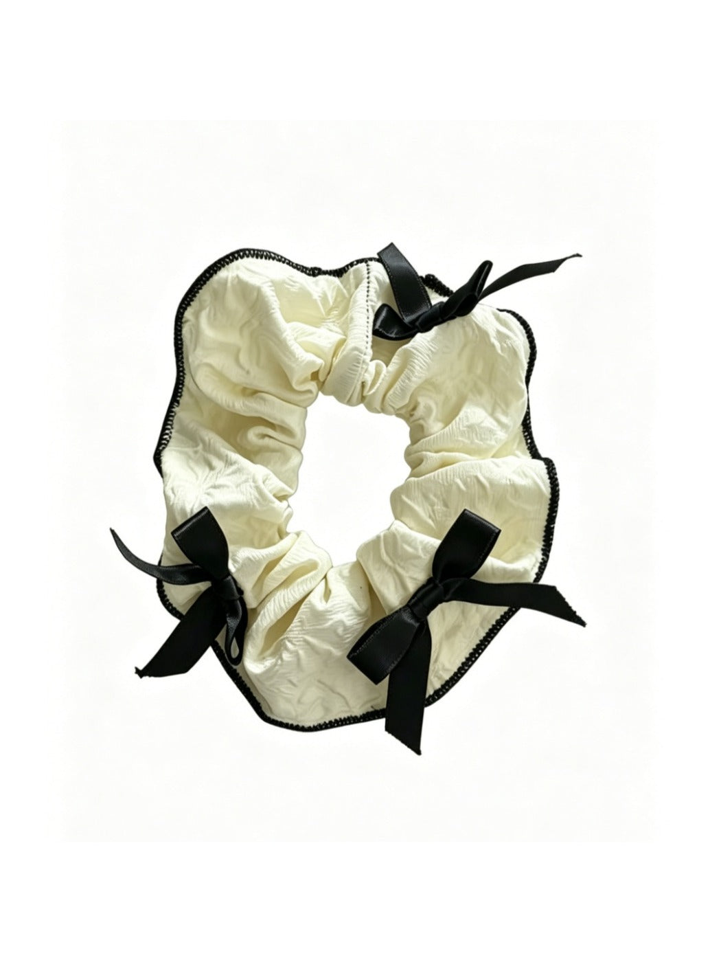 Side view of Gifty scrunchie showing red ribbon bow detail
