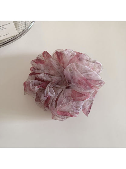 Gifty floral print hair scrunchie packaged in clear plastic with branding visible