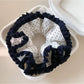 Gifty - Navy Trimmed Polka Dot Ruffled Scrunchie