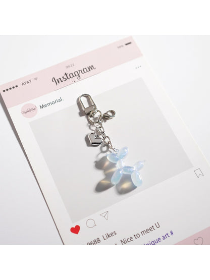 Keypus cartoon bag charm keychain shown from a top-down perspective