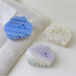 Close-up of Beau cloud shaped hair claw clip showing smooth matte finish