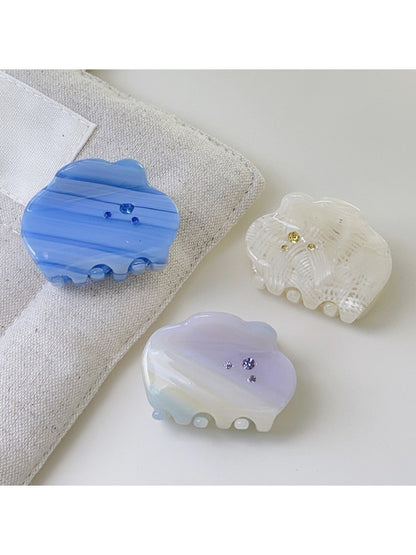 Close-up of Beau cloud shaped hair claw clip showing smooth matte finish