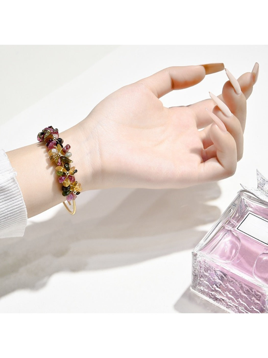 Lovra bracelet worn on wrist highlighting sparkling crystal charms