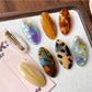 Beau Sweet Oval Acetate Hair Clip in tortoiseshell pattern on white background