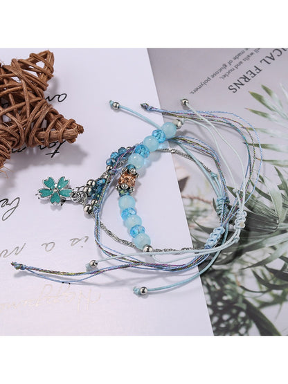 Lovra small bead bracelet worn with casual outfit on model's wrist