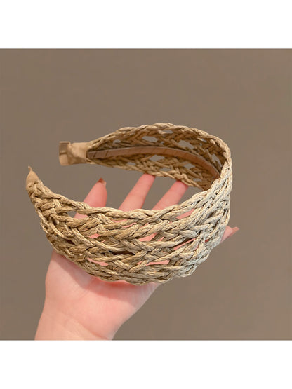 Close-up of Gifty hollow headband highlighting wide edge and detailed cutout design
