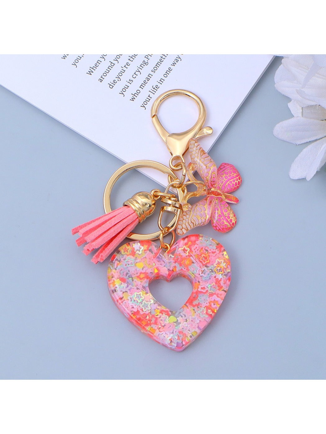 Keypus fashionable heart cutout pendant keychain isolated on white