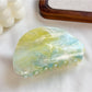 Top view of Beau hair claw clip showing symmetrical cloud pattern