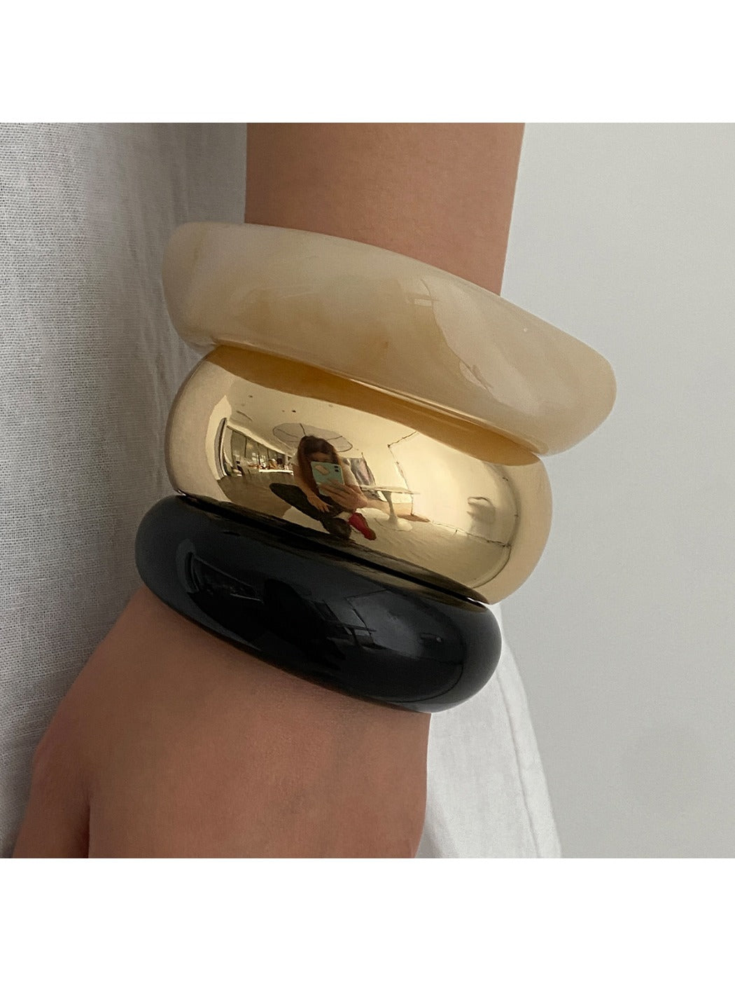 Lovra round bracelet worn on wrist, highlighting its polished finish