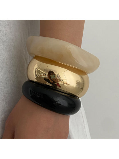 Lovra round bracelet worn on wrist, highlighting its polished finish