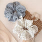 Gifty sweet cute tulle scrunchie with white polka dots on pink fabric