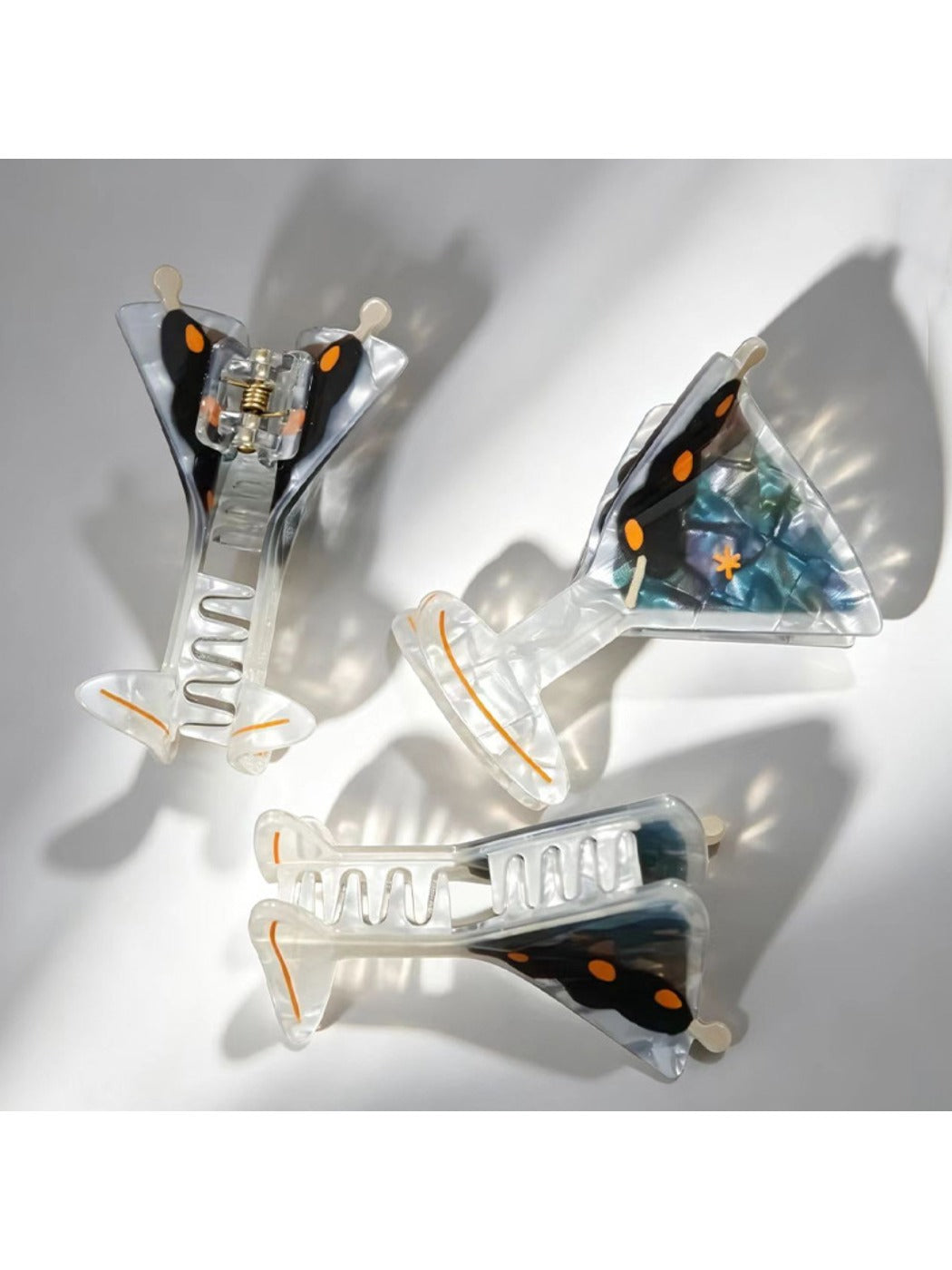 Side view of Beau goblet shaped claw clip highlighting its rounded goblet shape
