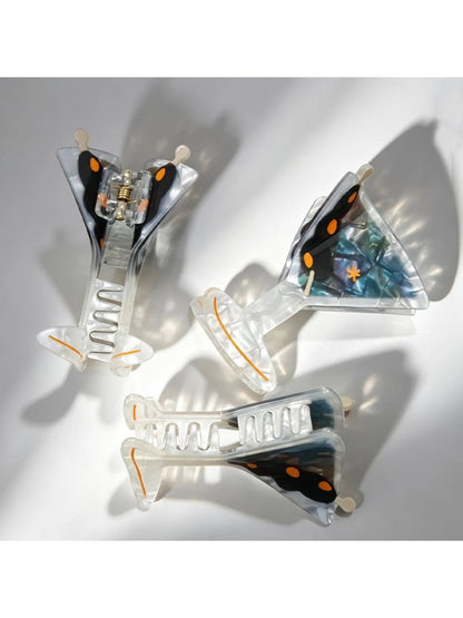 Side view of Beau goblet shaped claw clip highlighting its rounded goblet shape