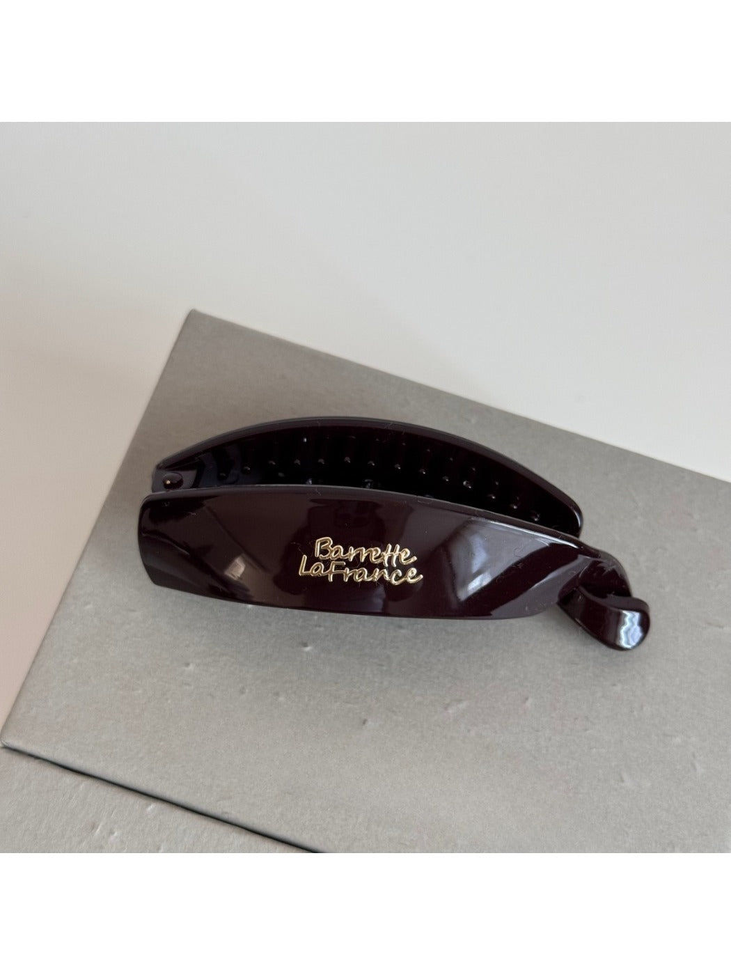 Beau minimalist stick hair clip angled to highlight minimalist design details