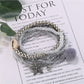 Lovra multi-row small bead bracelet styled with casual outfit on wrist