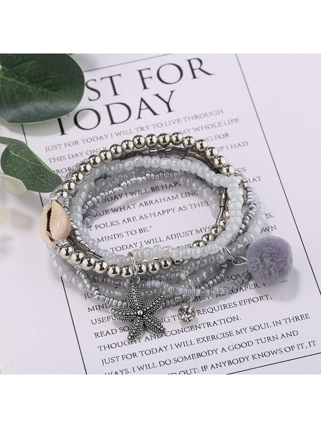 Lovra multi-row small bead bracelet styled with casual outfit on wrist