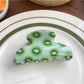 Beau half circle shark claw clip with multicolored fruit illustrations