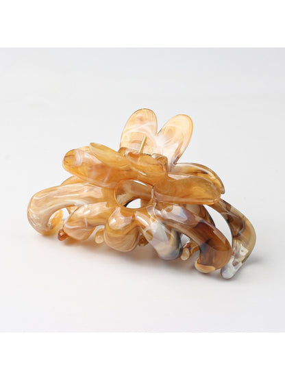 Beau hair clip displayed on a white background highlighting shape