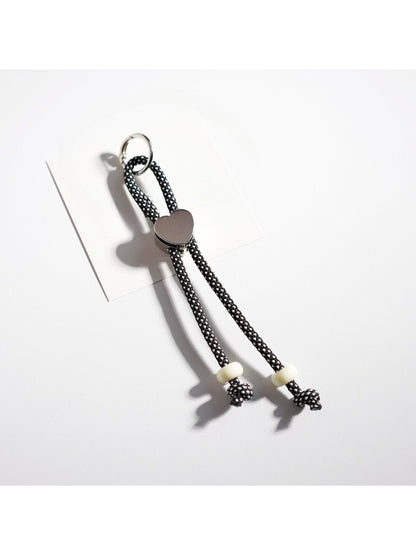 Top view of colorful rope heart keychain showing symmetrical design