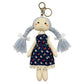 Fabric yarn doll keychain with smiling embroidered face and bright yarn accents