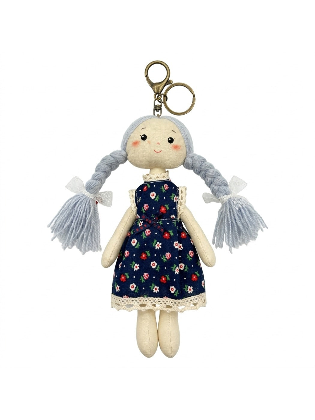 Fabric yarn doll keychain with smiling embroidered face and bright yarn accents