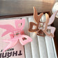 Side view of Beau acrylic bow claw clip highlighting curved design