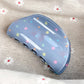 Blue star print hair claw clip open showing inner teeth