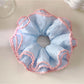 Gifty Sweet Striped Four Layer Scrunchie worn on a wrist as a stylish accessory