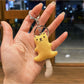 Multiple bear keychains in different colors arranged side by side