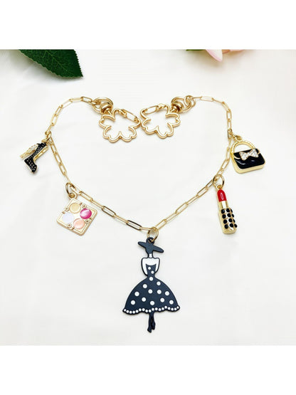 Close-up of Keypus pendant bag charm showing intricate metal design and clasp