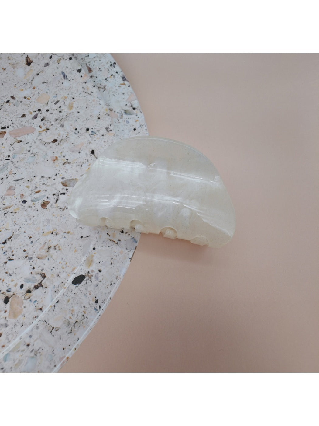 Beau hair clip styled in long hair showcasing its decorative effect