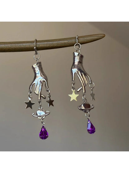 Close-up of Earedge Magic Hand Pendant Earrings with gold-tone finish
