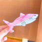 Beau shark shape claw clip in natural light on white background