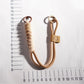 Keypus colorful rope keychain displayed hanging from a hook