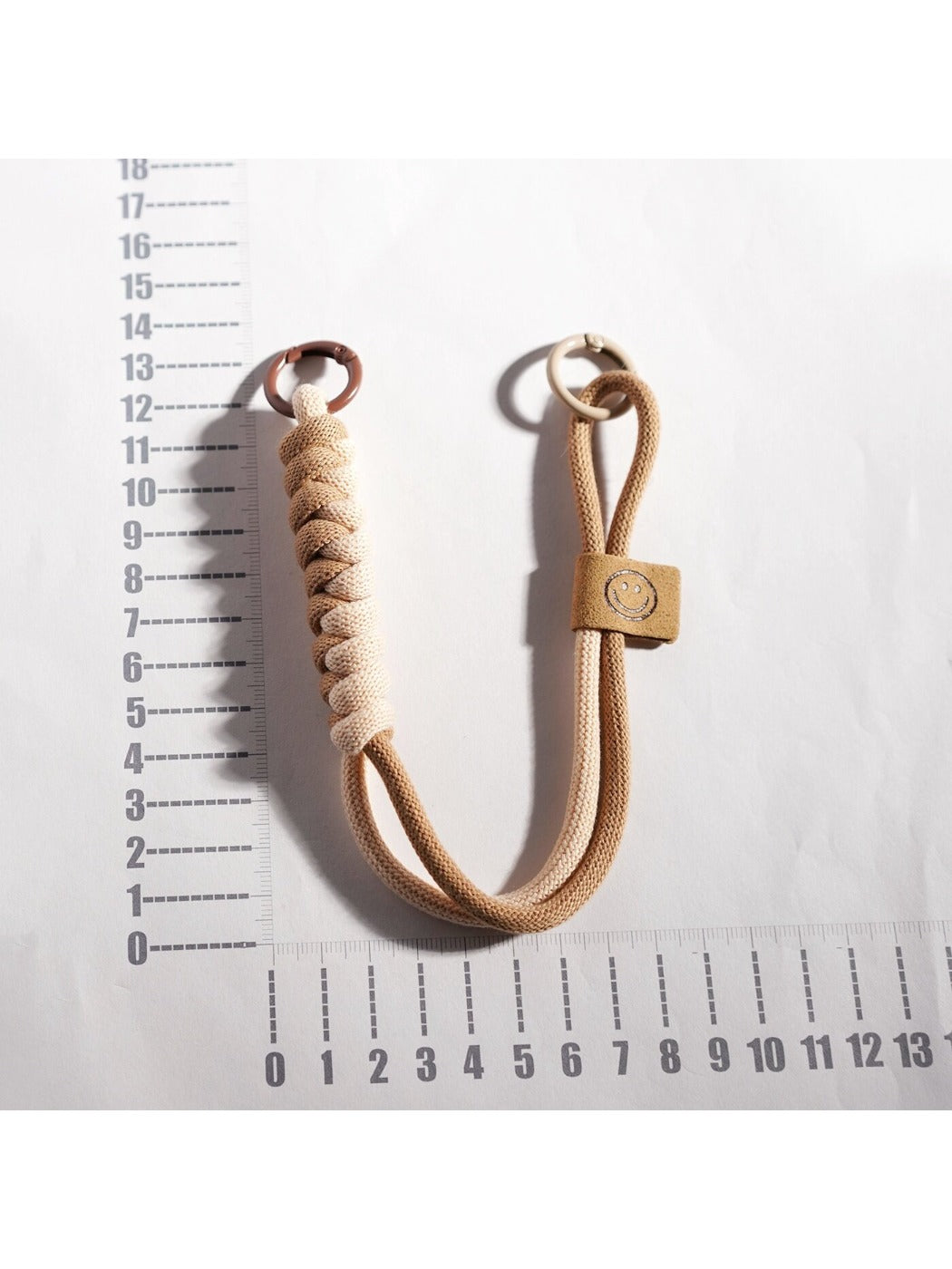 Keypus colorful rope keychain displayed hanging from a hook