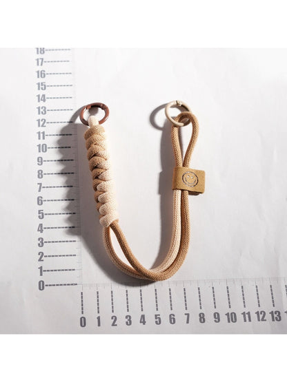 Keypus colorful rope keychain displayed hanging from a hook