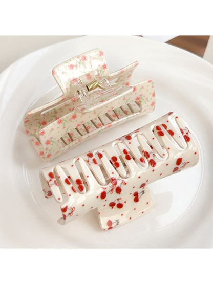 Side view of Beau floral print square hair claw clip highlighting clip mechanism