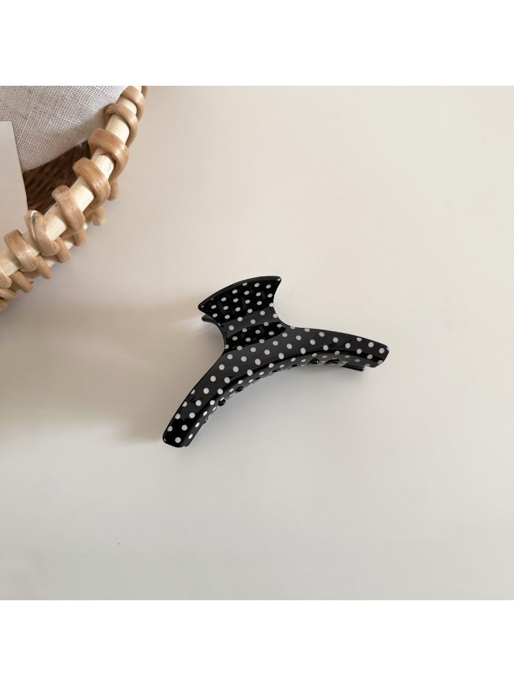 Beau polka dot acetate hair clip angled to show both front and side details