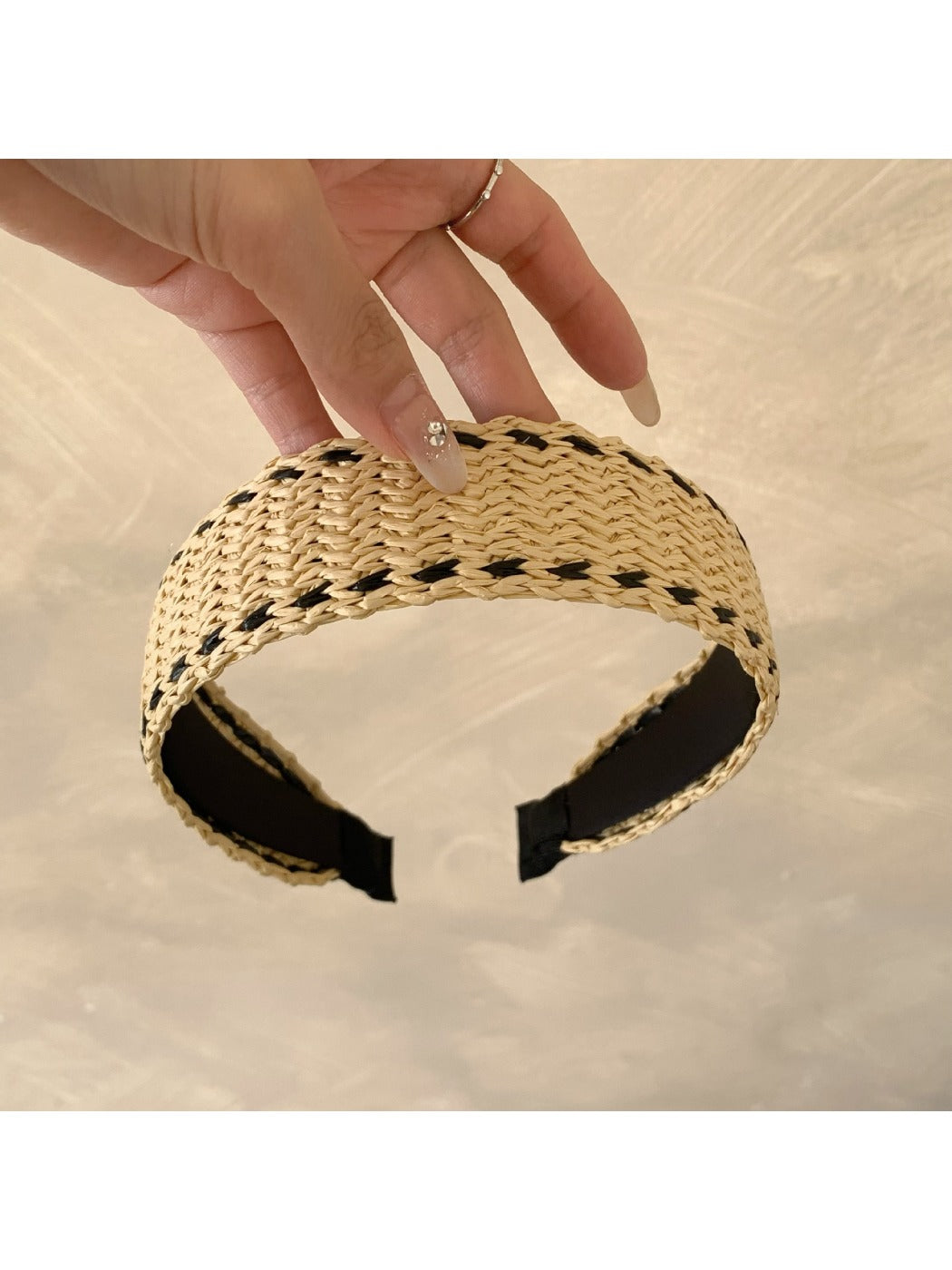 Gifty minimalist wide bohemian headband folded to show flexibility and fabric details