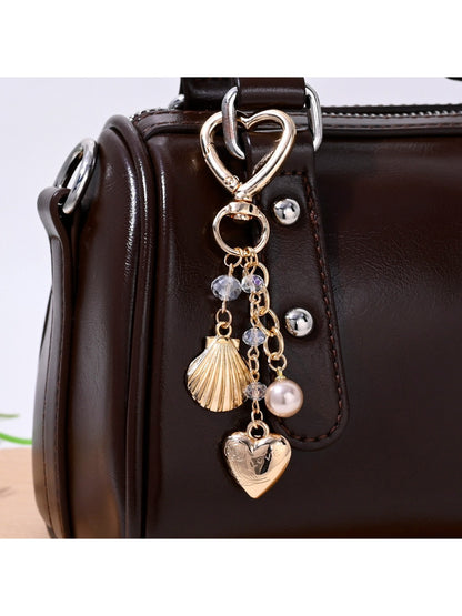 Close-up of starfish heart keychain showing textured surface and keyring
