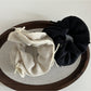 Side view of Gifty double layer chiffon bow scrunchie highlighting fabric texture