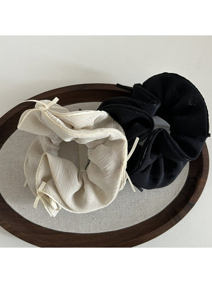 Side view of Gifty double layer chiffon bow scrunchie highlighting fabric texture