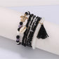 Side angle of Lovra fashionable bracelet featuring colorful beads and small tassel
