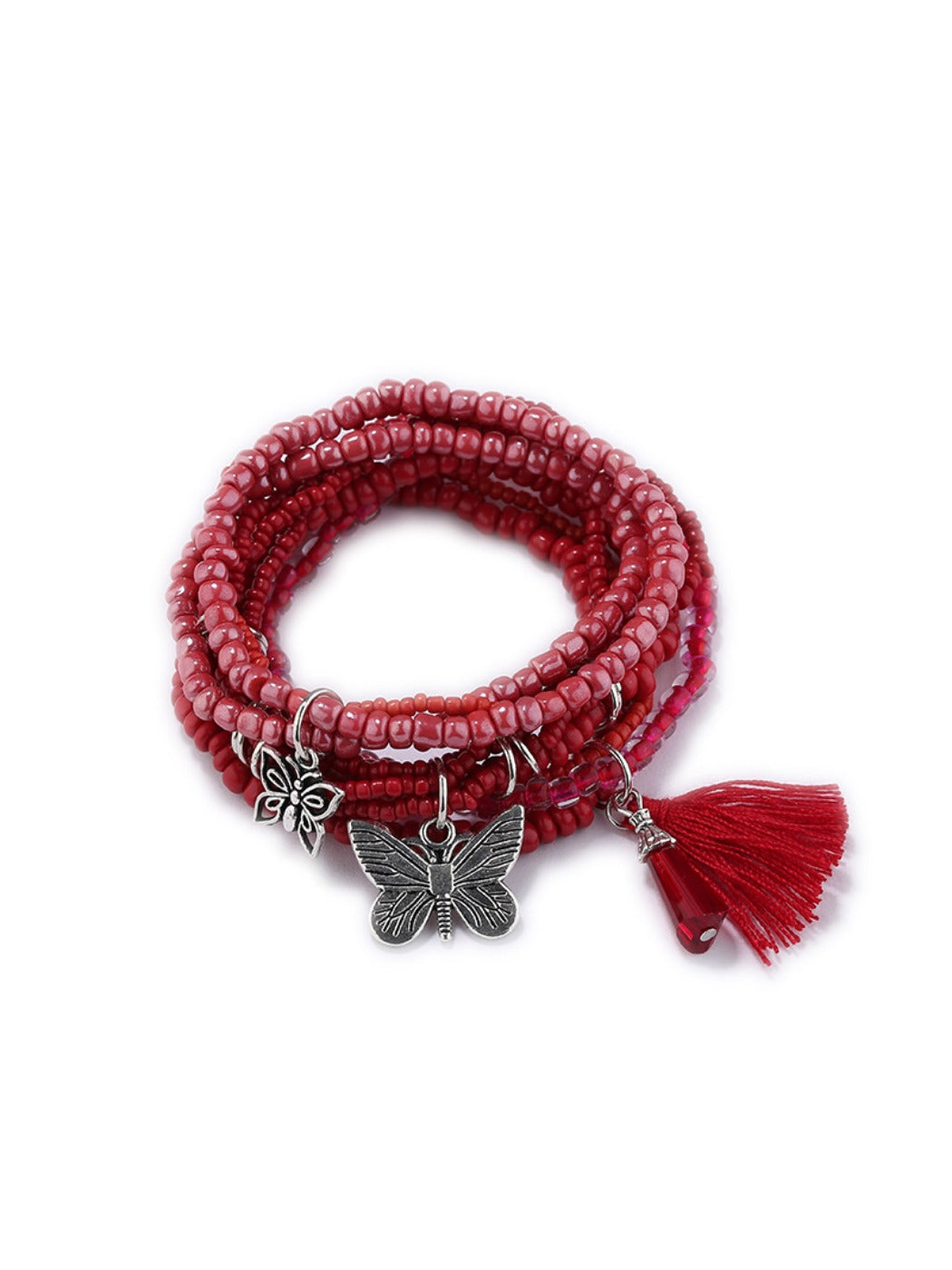 Butterfly pendant bracelet styled with casual outfit on model's wrist