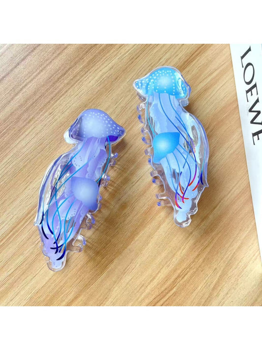 Beau jellyfish shaped claw clip in translucent pastel colors on white background