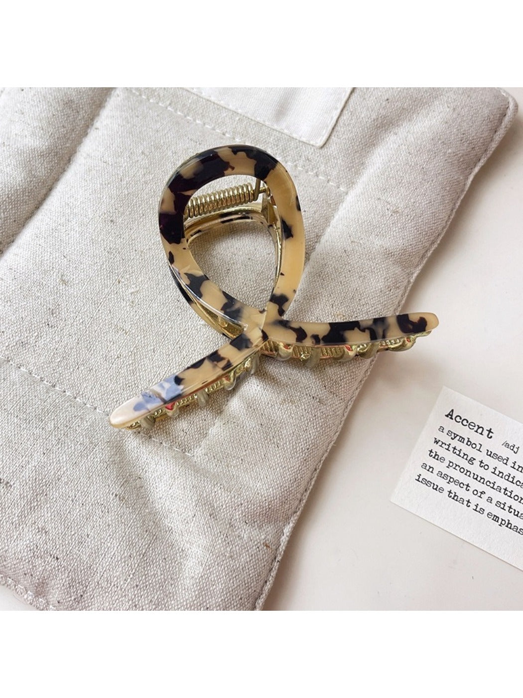 Top view of Beau vintage crisscross hair claw clip with glossy finish