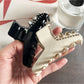 Beau acetate claw clip with rhinestone embellishments on a white background