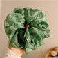 Gifty scrunchie packaged in minimalistic eco-friendly wrapping