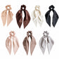 Clean overview of seven solid satin scarf scrunchie variants