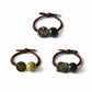 Clean overview of three green charm hair tie variants